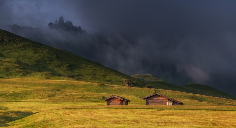 Misty Mountain Cabins by Ales Krivec — canvas wall art