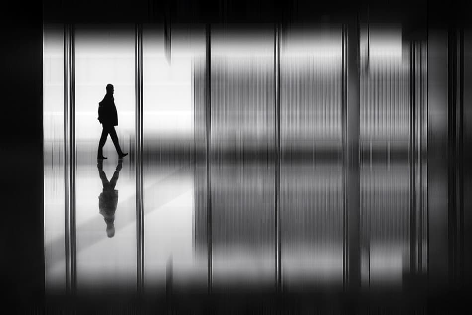 Walking Man Reflection by Tanja Ghirardini — canvas wall art