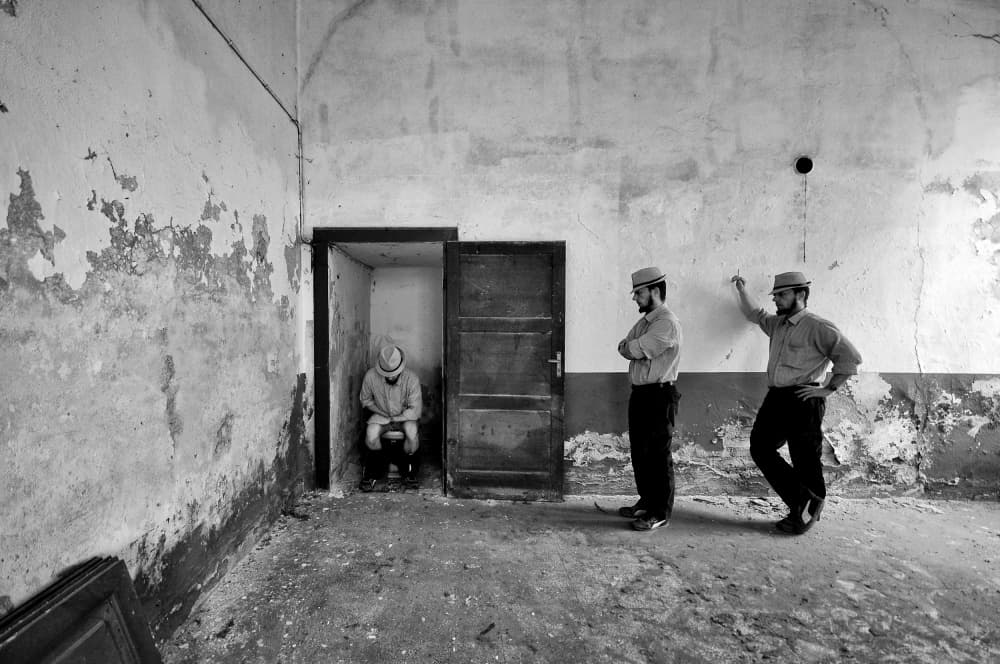 Three Men In Decay by Carlo Ferrara — canvas wall art