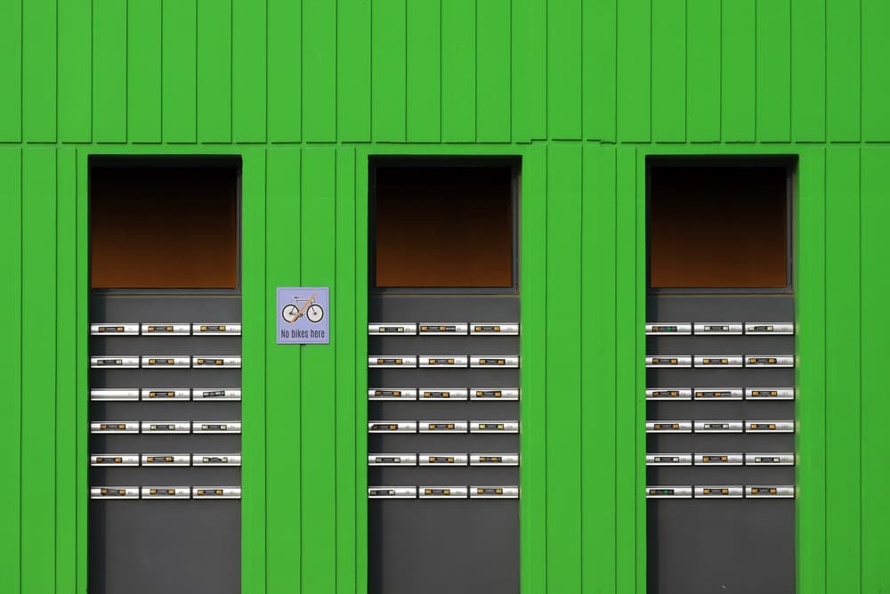 Vibrant Green Mailboxes by Hans-Wolfgang Hawerkamp — canvas wall art