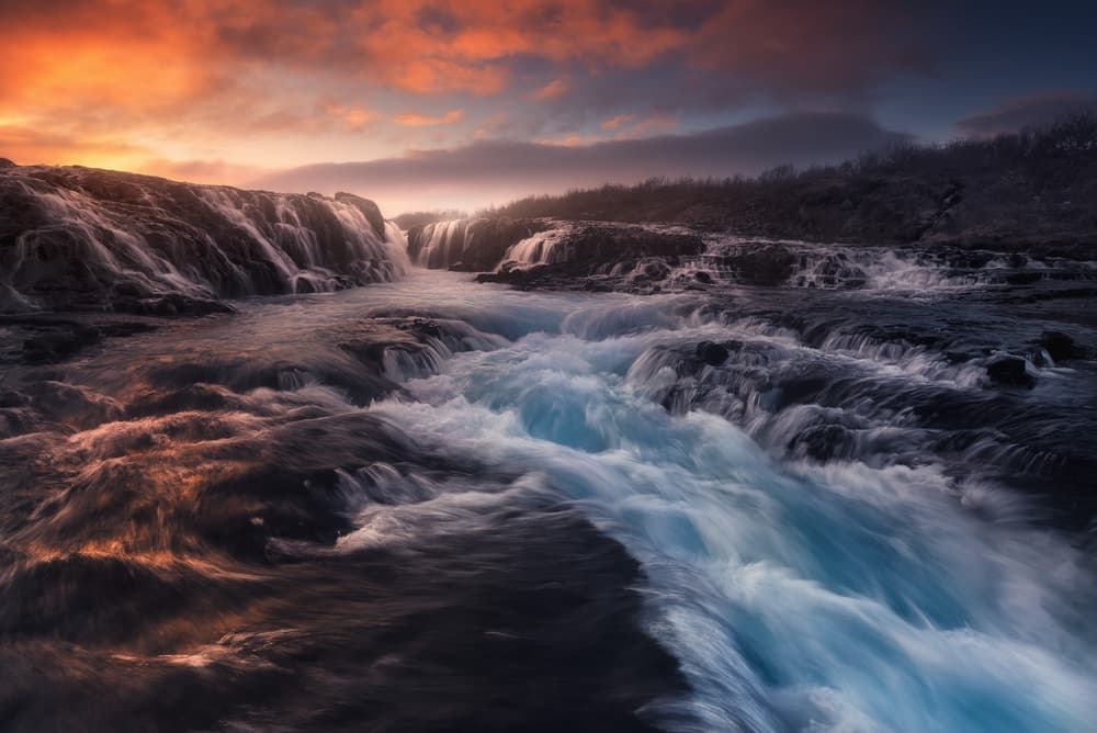 Glacial River Sunset Flow by Carlos F. Turienzo — canvas wall art