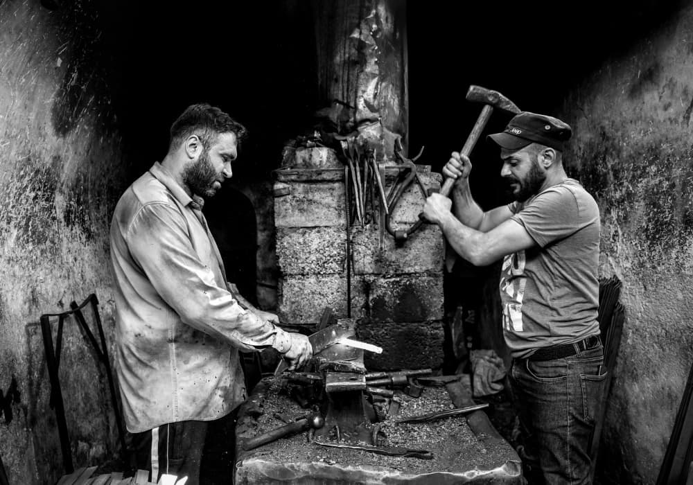 Blacksmiths At Work by Bashar Alsofey — canvas wall art
