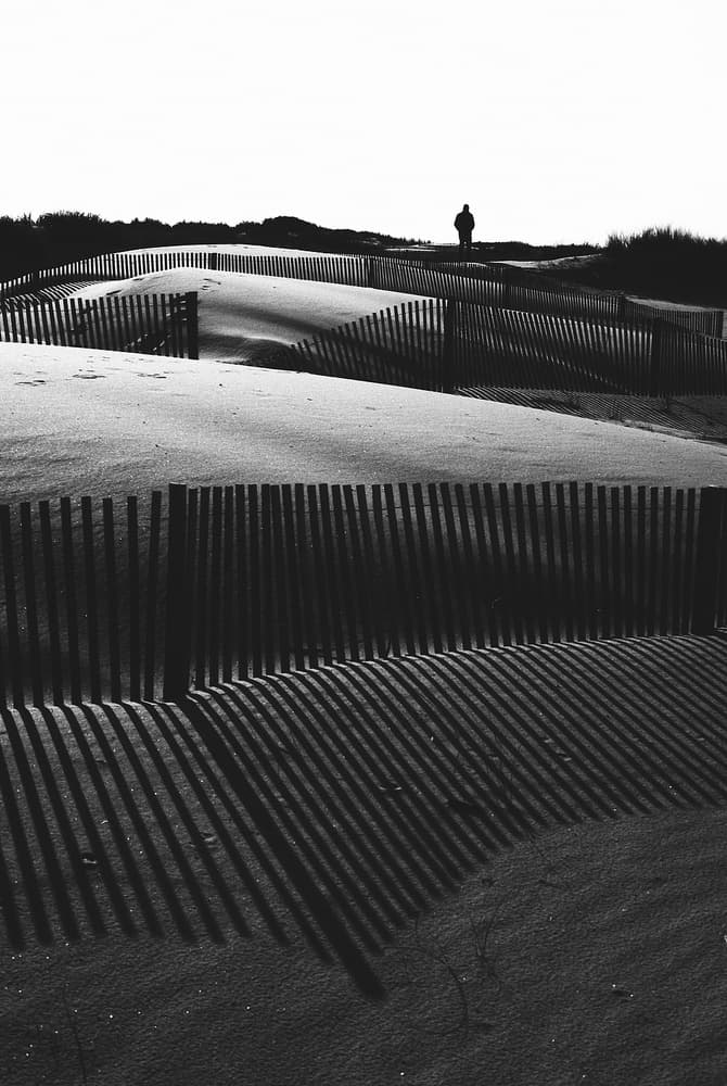 Winter Dunes Solitary Figure by Rui Ferreira — canvas wall art