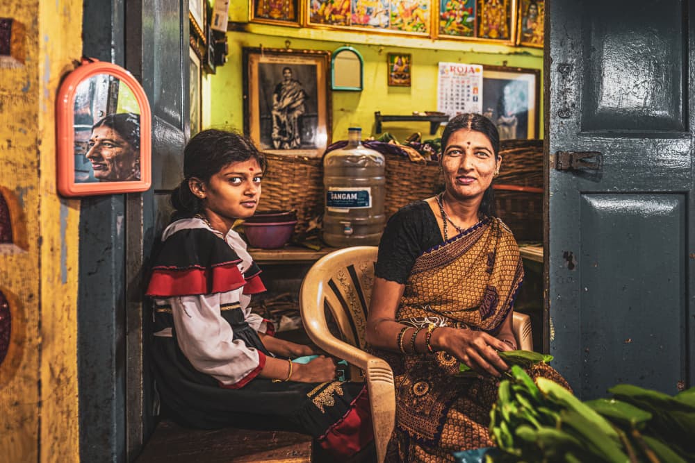Indian Mother Daughter Portrait by Marco Tagliarino — canvas wall art