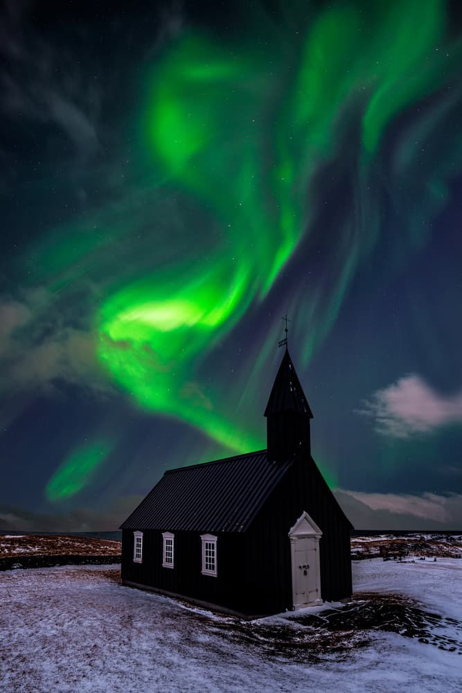 Green Aurora Black Church by David Martin Castan — canvas wall art