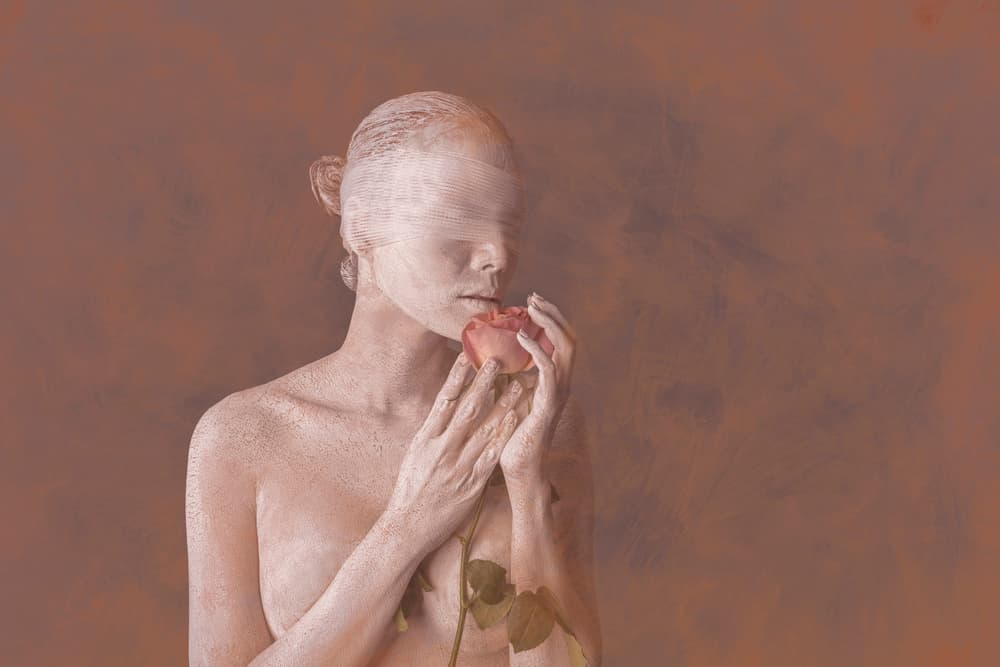 Blindfolded Woman with Rose by Itthipol Deemee — canvas wall art
