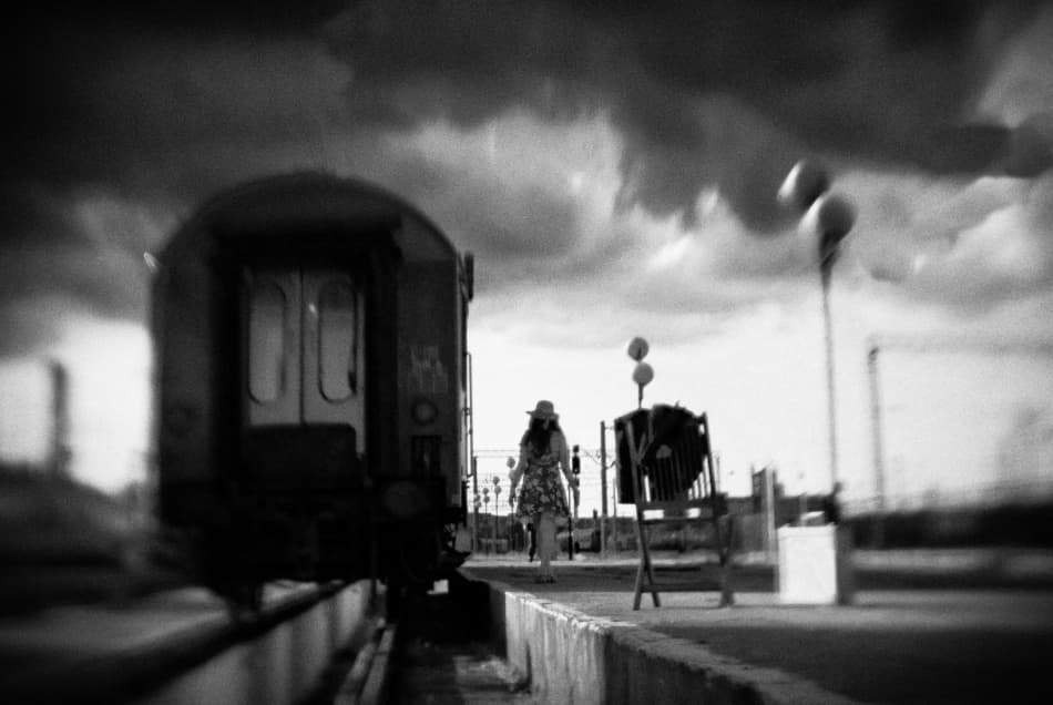 Woman At Train Station by Codrin Lupei — canvas wall art