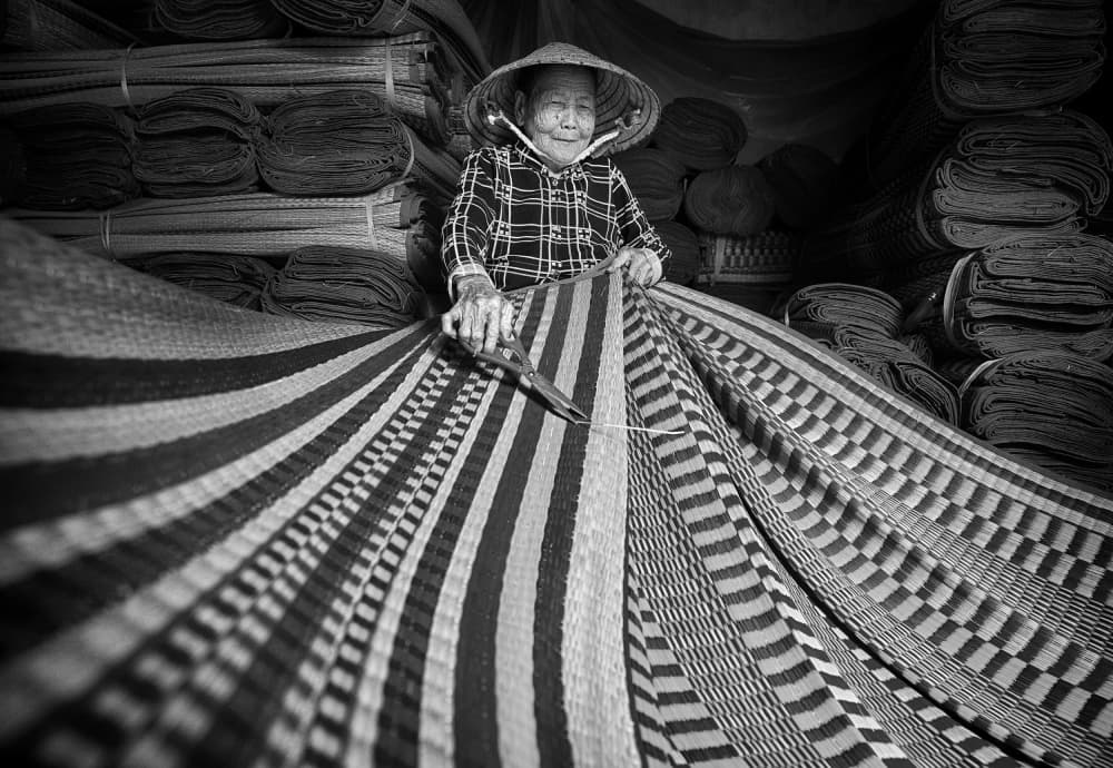 Vietnamese Woman Weaving by Angela Muliani Hartojo — canvas wall art