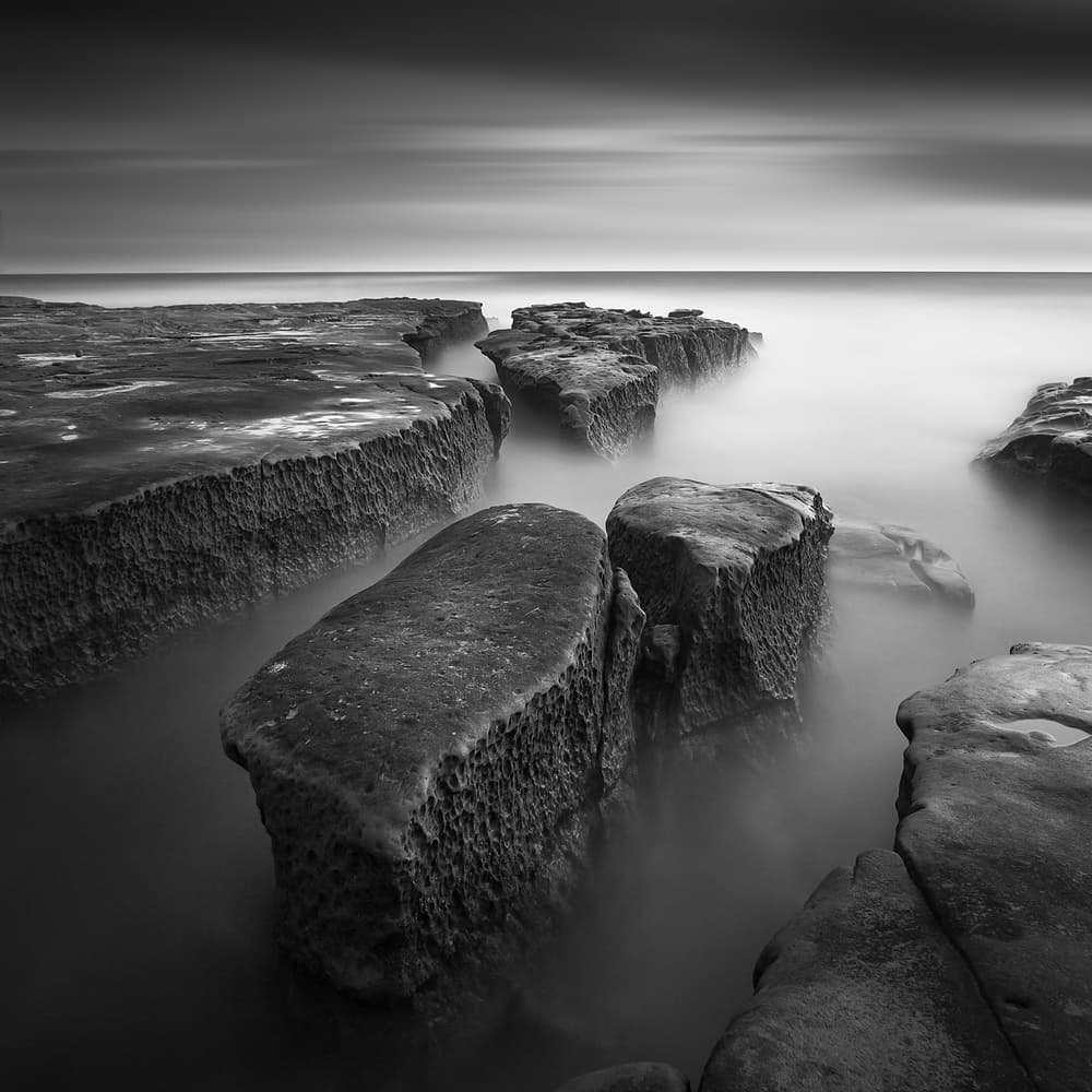 Moody Coastal Rocks by Yi Fan — canvas wall art