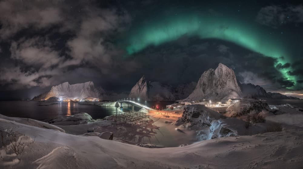 Aurora Borealis Winter Village by Carlos Gonzalez — canvas wall art