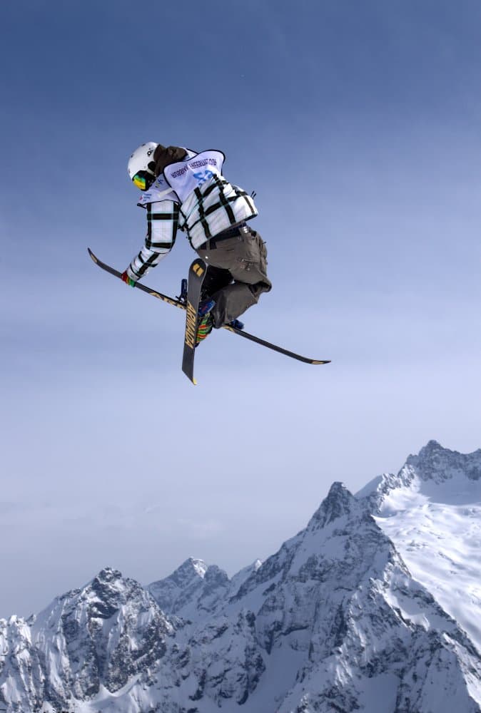 Skier Soaring Mountain Peaks by Arsen Alaberdov — canvas wall art