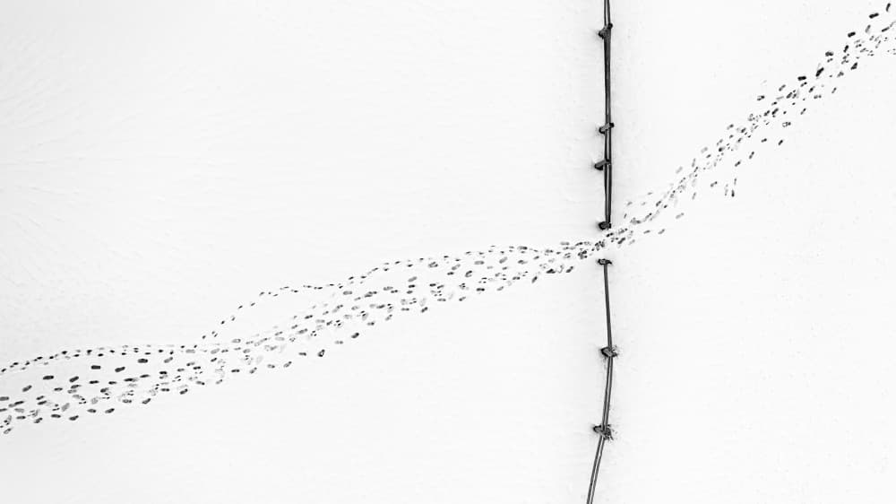 Winter Tracks and Fence by Mei Xu — canvas wall art