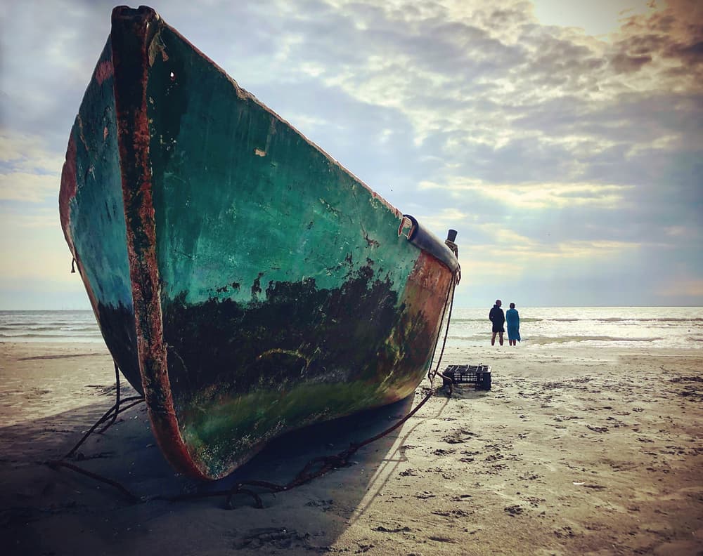 Weathered Beach Boat by Mirela Momanu — canvas wall art
