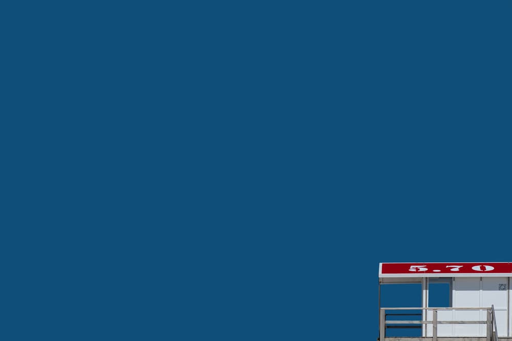 Red Roof Blue Sky by Rolf Endermann — canvas wall art