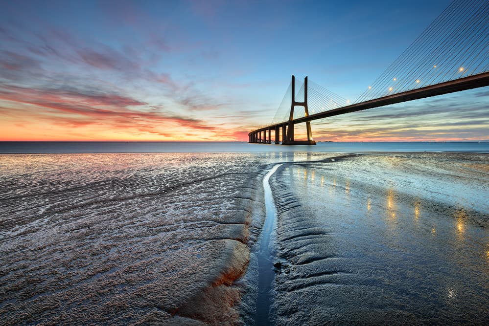Coastal Bridge Sunset by Alvaro Roxo — canvas wall art