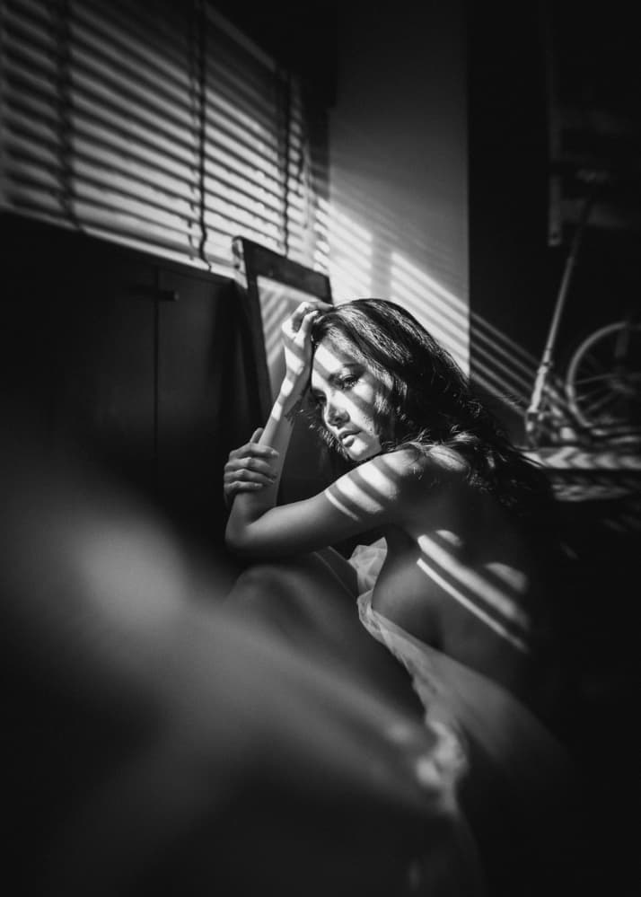 Pensive Woman Shadow Play by ADIREK M — canvas wall art