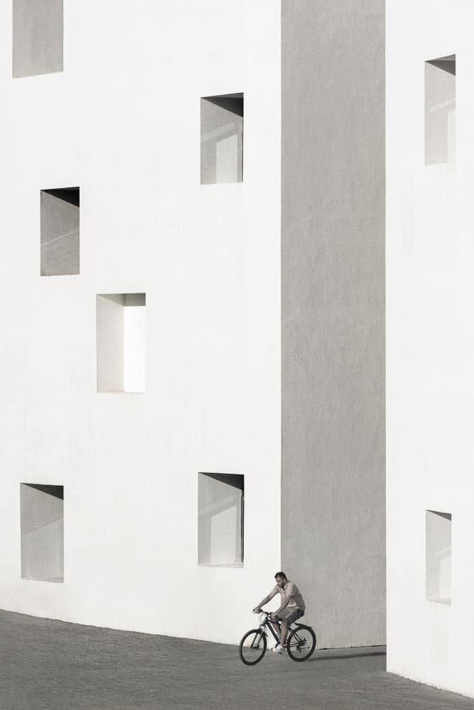Man Riding Modern Architecture by Mei Xu — canvas wall art