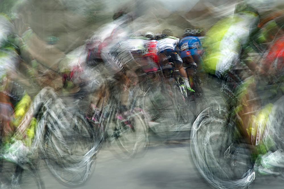 Speeding Cyclists Blur by Milan Malovrh — canvas wall art