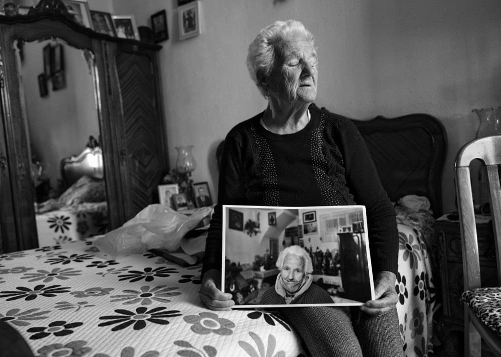 Old Woman's Memory by Carlos Costa — canvas wall art