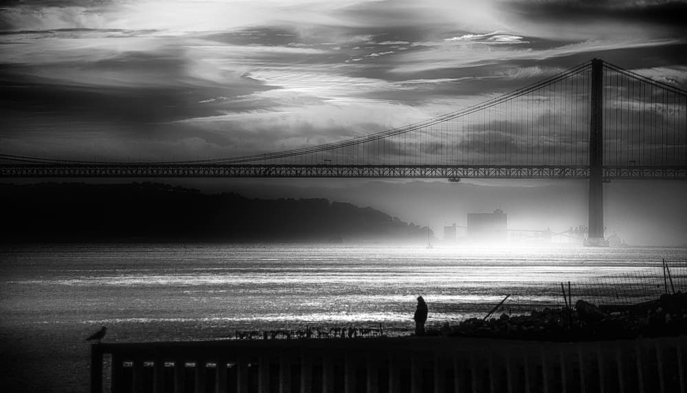 Lone Figure Bridge View by Paulo Abrantes — canvas wall art