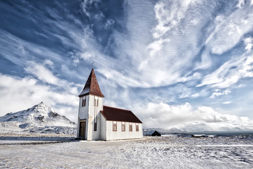 Isolated Winter Church by Mike Kreiten — canvas wall art