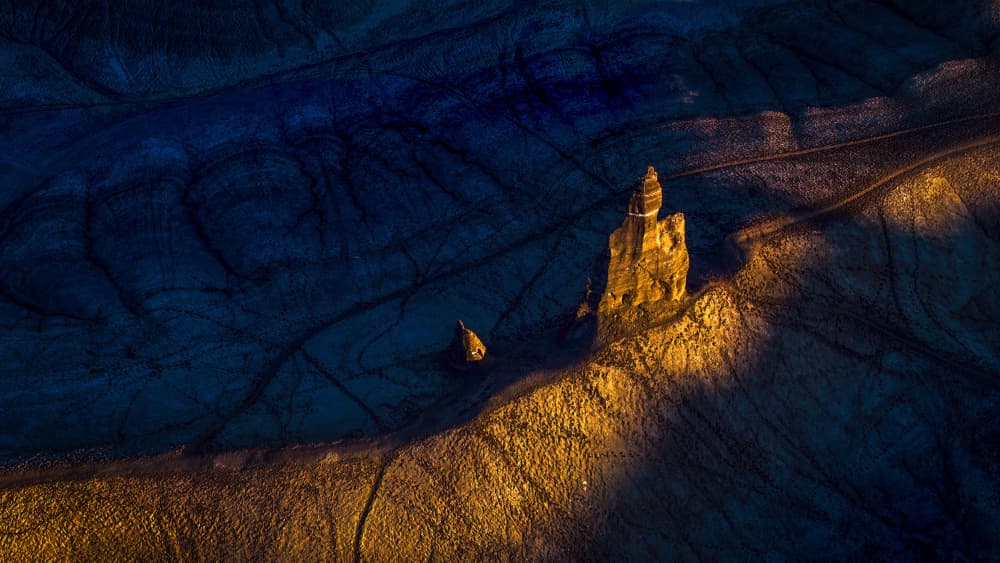 Golden Desert Rock Formation by John J. Chen — canvas wall art