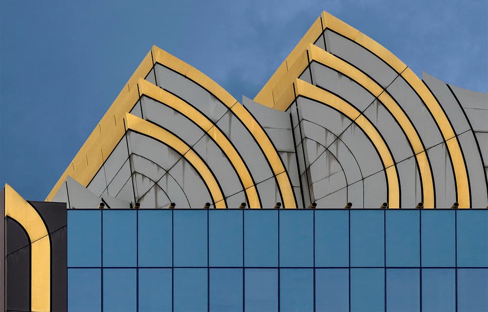 Golden Arcs Building by Jef Van den Houte — canvas wall art