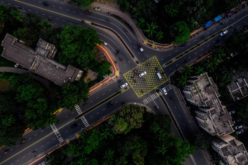 Busy City Intersection by Anindita Roy — canvas wall art