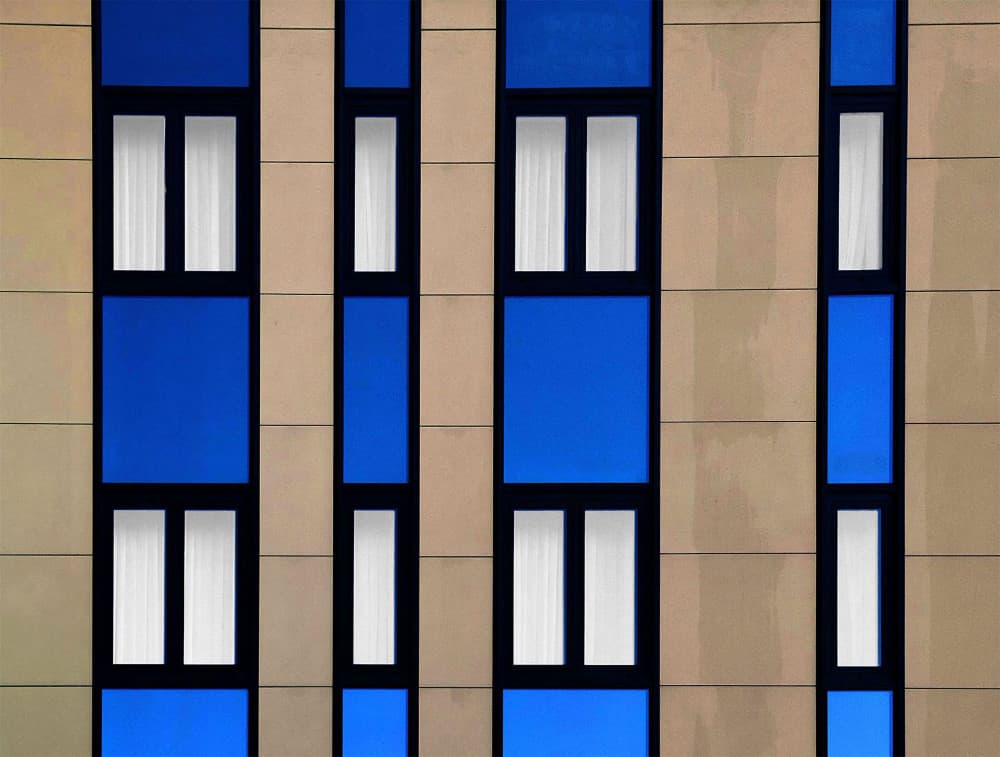 Blue Geometric Facade by Jef Van den Houte — canvas wall art