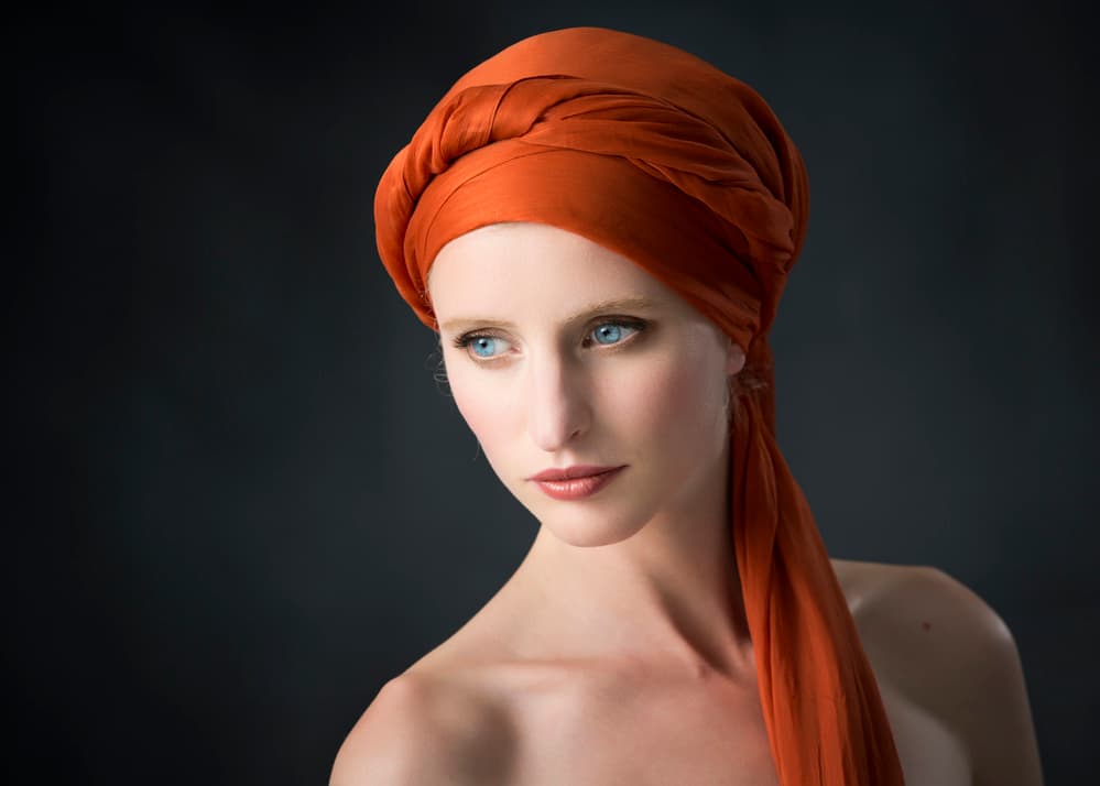 Serene Orange Turban by Catchlight Studio — canvas wall art