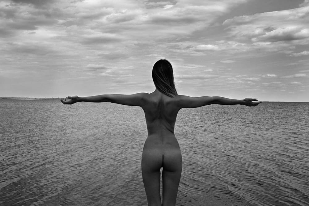 Bare Back Ocean View by Mikhail Faletkin — canvas wall art