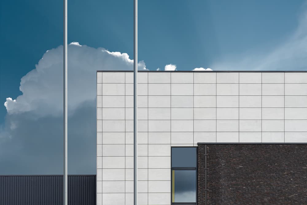 Geometric Building Blue Sky by Luc Vangindertael (laGrange) — canvas wall art
