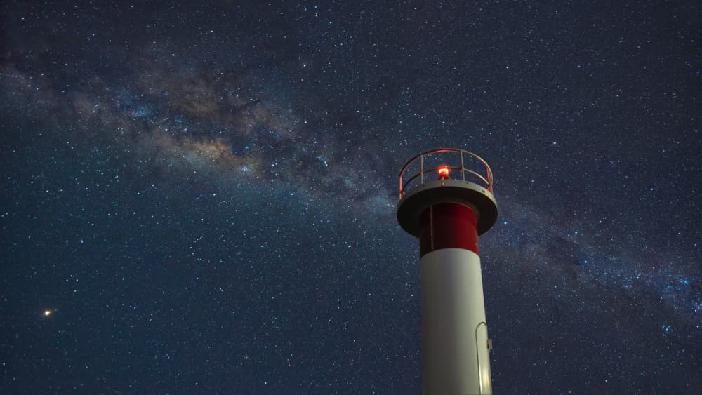 Lighthouse Under Milky Way by Emanuel Papamanolis — canvas wall art