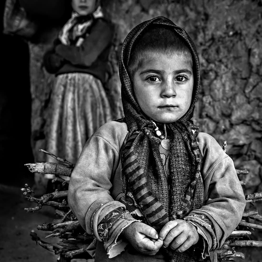 Pensive Child Portrait by Mohammadreza Momeni — canvas wall art