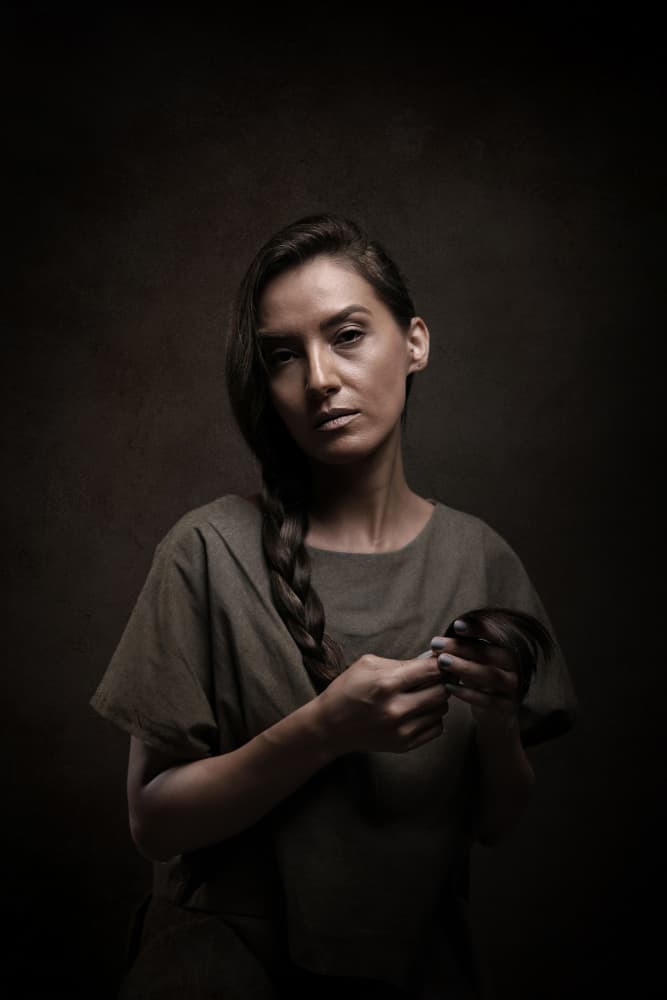 Pensive Braided Portrait by Moein Hasheminasab — canvas wall art