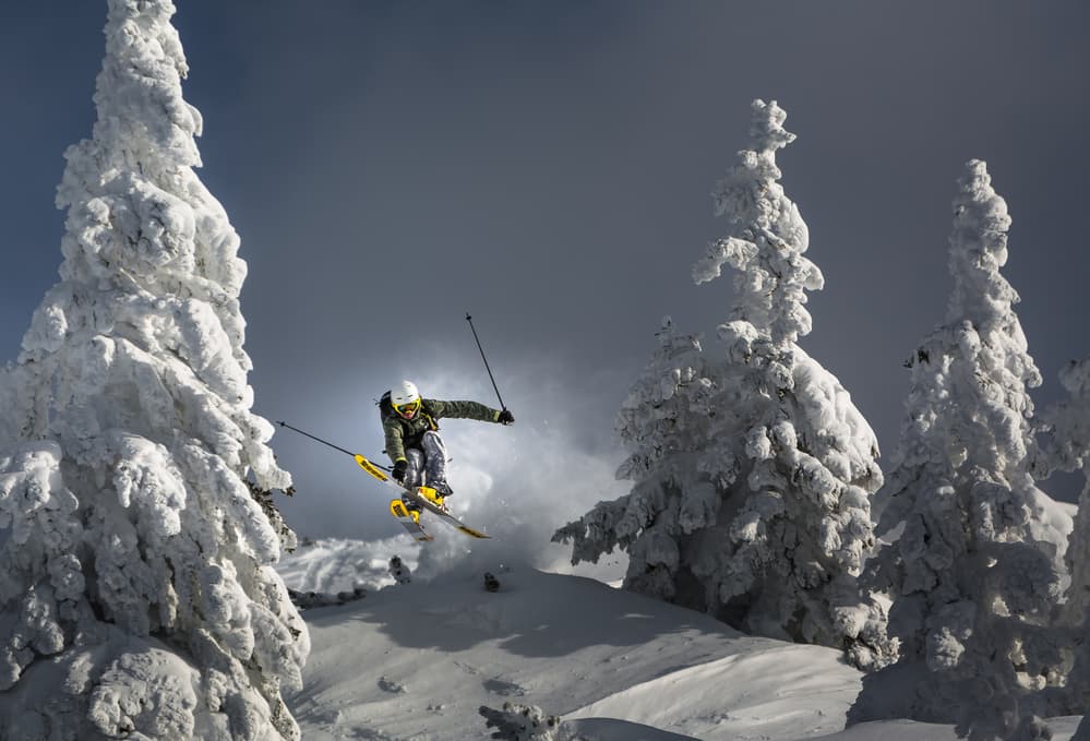 Skier Mid-Air Jump by Sandi Bertoncelj — canvas wall art