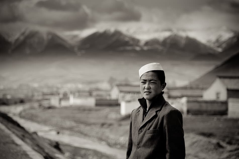 Pensive Boy Mountain Village by Nicolas Marino — canvas wall art