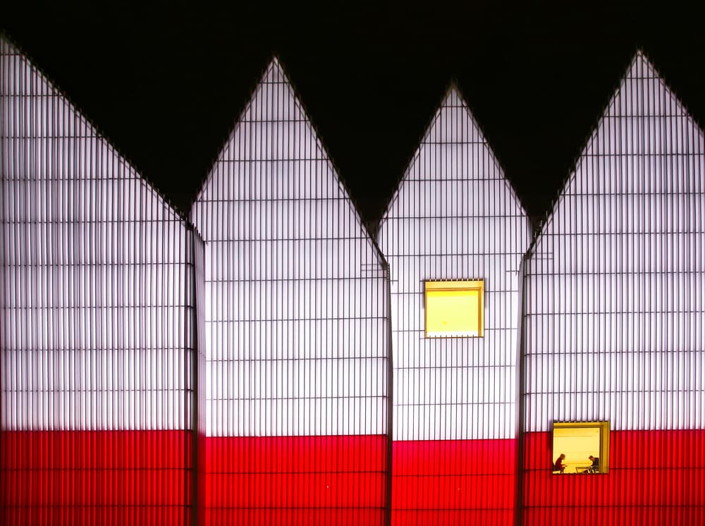 Red White Geometric Facade by Anna Niemiec — canvas wall art