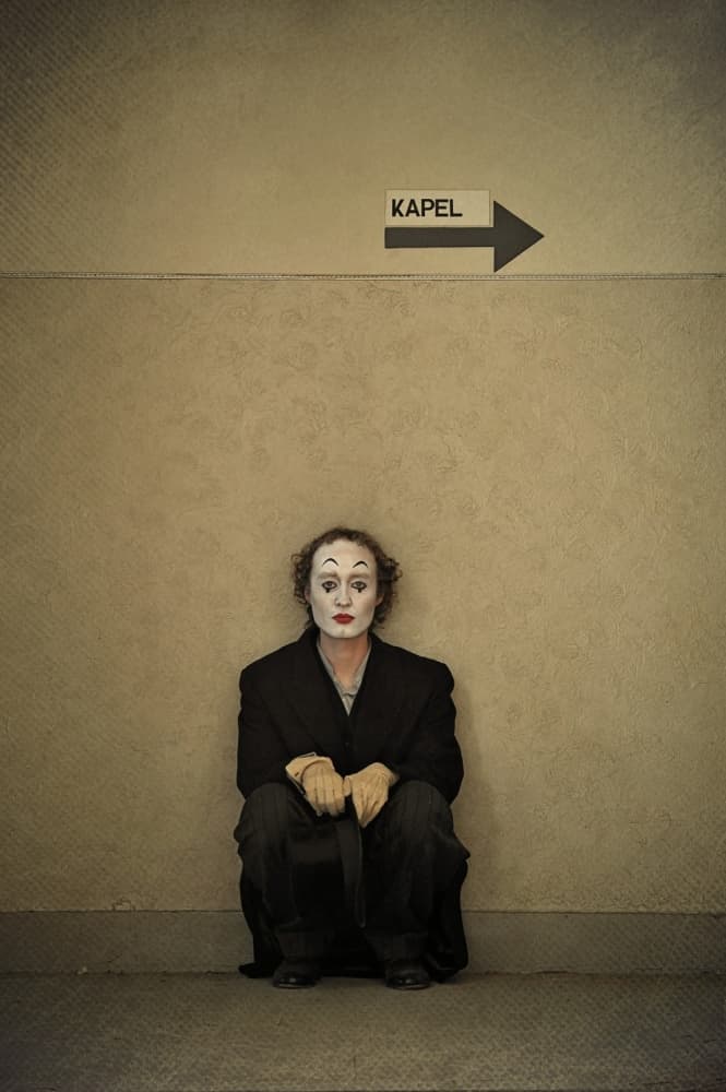 Mime Waiting By Sign by Monika Vanhercke — canvas wall art
