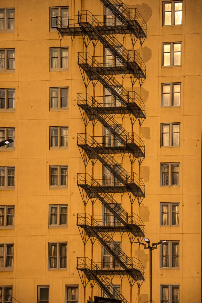 Golden Hour Fire Escape by Ramiz Sahin — canvas wall art