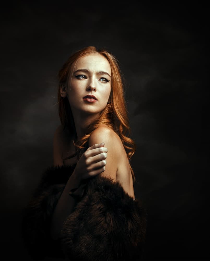 Pensive Redhead Portrait by Danil Rudoi — canvas wall art