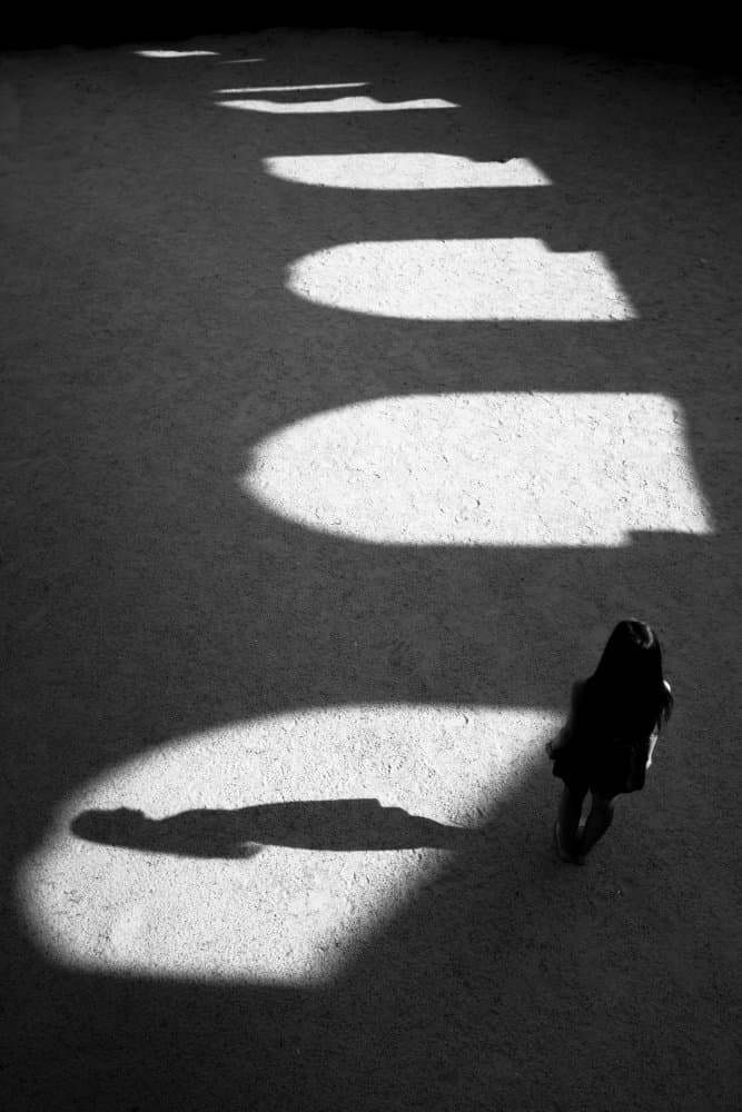 Solitary Figure Walking by Evelin Dobrev — canvas wall art