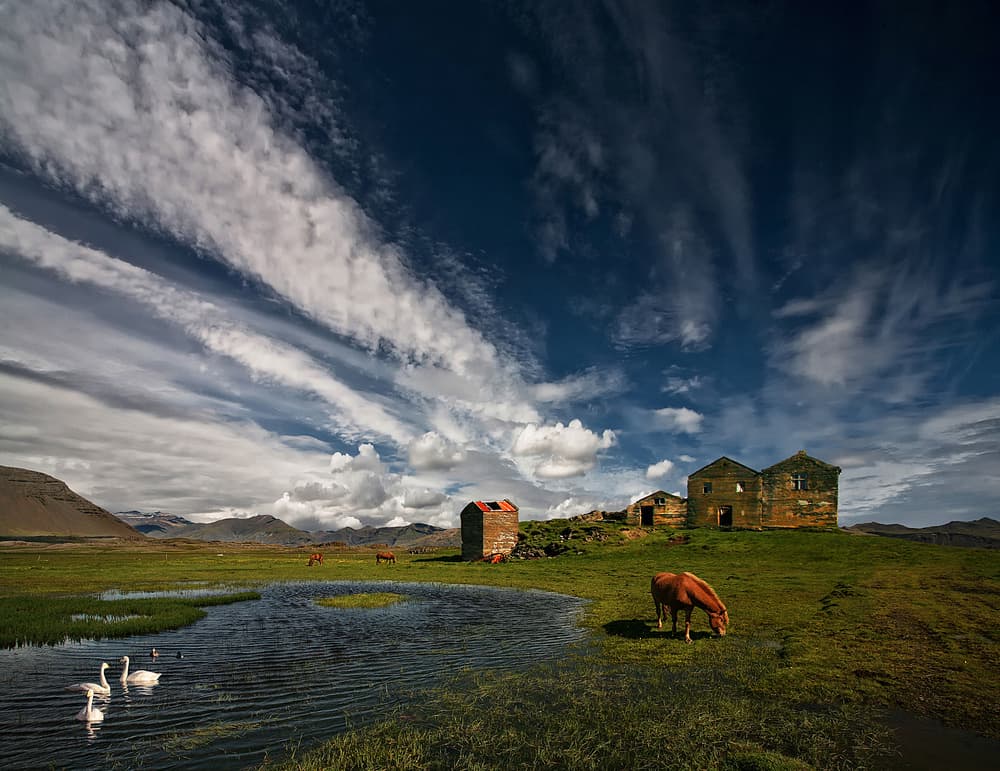 Dramatic Sky Over Rural Farm by Þorsteinn H. Ingibergsson — canvas wall art