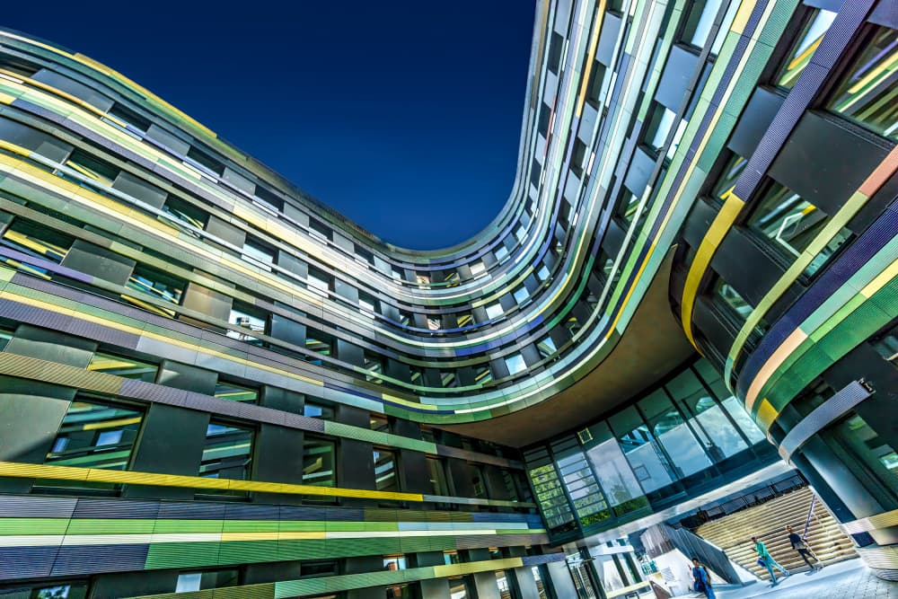 Colorful Curved Modern Building by Stephan Rückert — canvas wall art