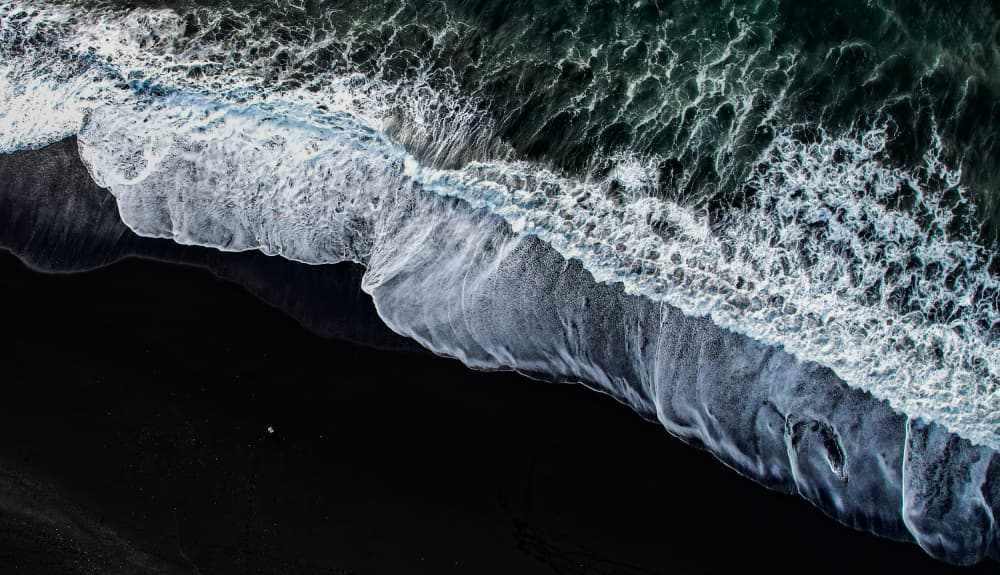Moody Black Sand Waves by Rui Wang — canvas wall art