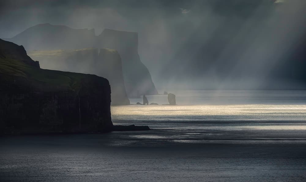 Sunlit Coastal Cliffs by Wim Denijs — canvas wall art