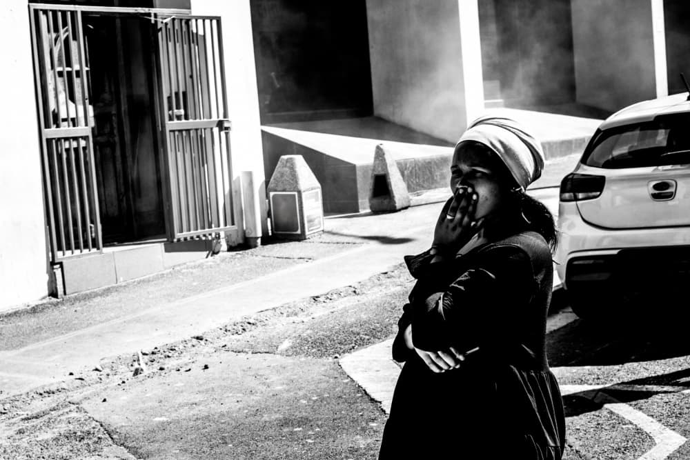 Woman Yawning on Street by Dan Edwards — canvas wall art