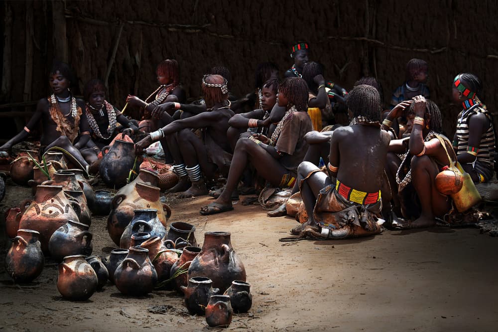 African Village Potters by Irene Perovich — canvas wall art
