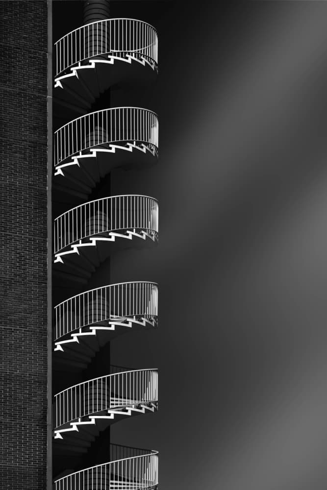Monochrome Spiral Staircase by Greetje van Son — canvas wall art