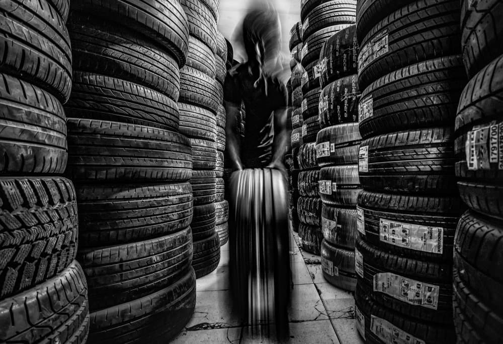 Industrial Tire Stacks by AMIR ALI NAVADEH SHAHLA — canvas wall art